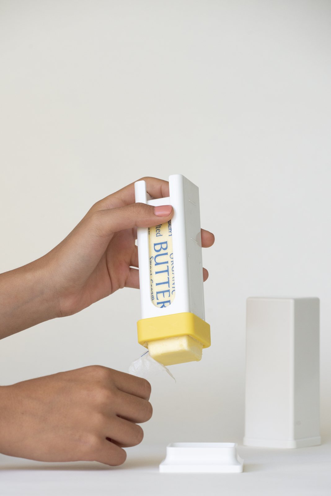 Peeling the wrapper back as the butter is used