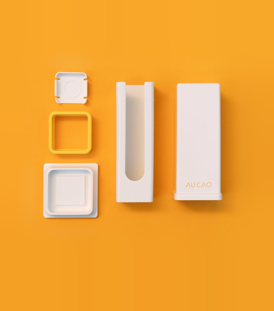The ButterBox™ parts laid out: slider cap, silicone lip, base, holder and cover
