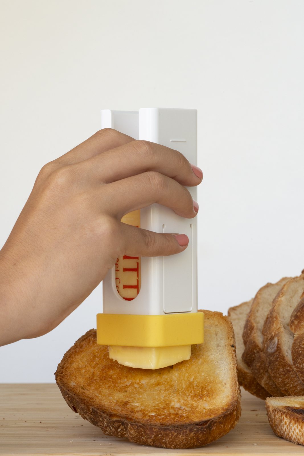 Buttering toast straight from The ButterBox™
